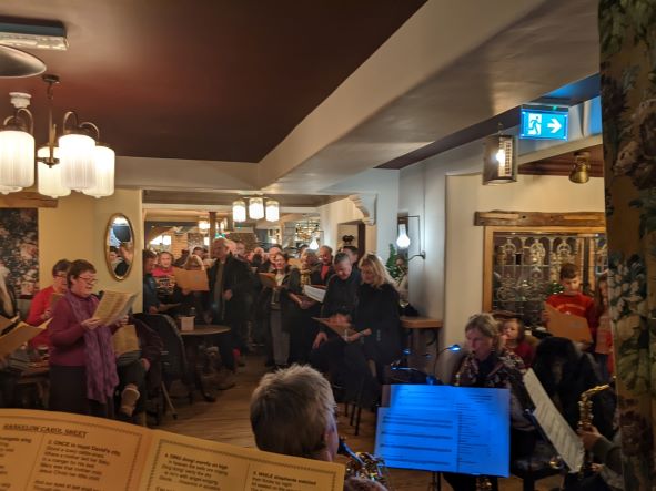 Carol singing in the White Lion